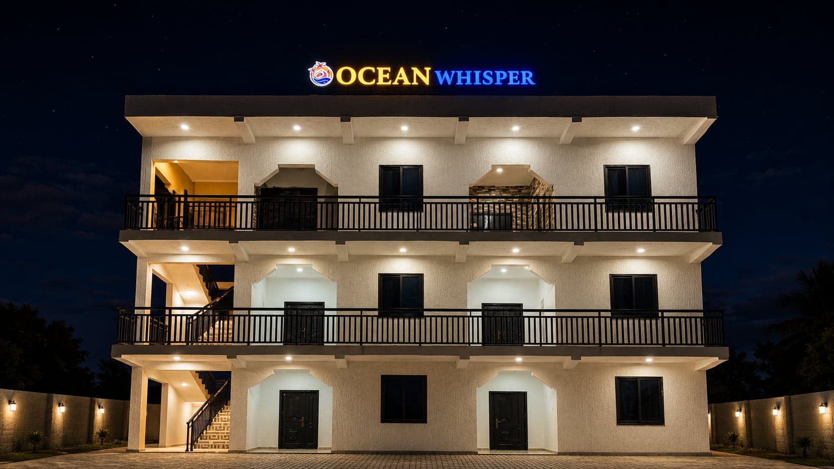 Ocean Whisper apartments at night in Ada Foah